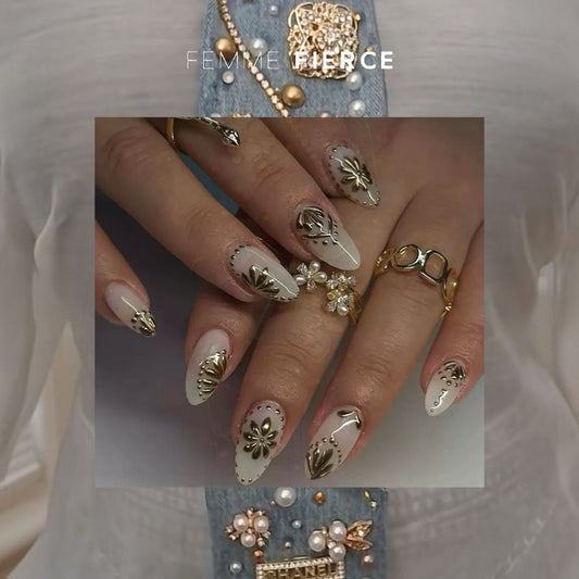 classy almond nails gold embellishment