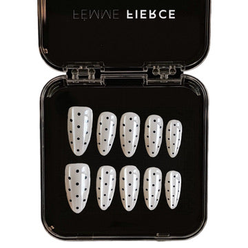 white press on nails with black polka dots