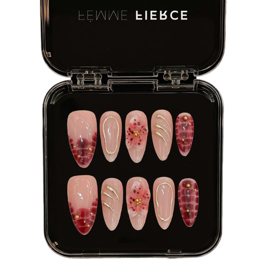 red floral press on nails with nude base and gold details