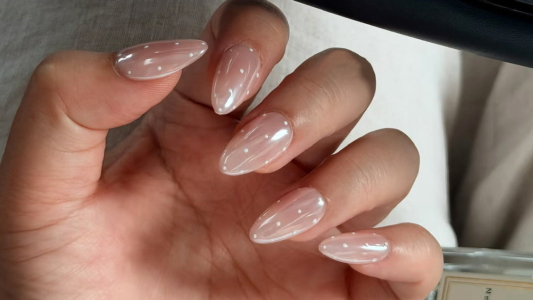 Natural nude press-on nails applied for a secure, salon-quality fit