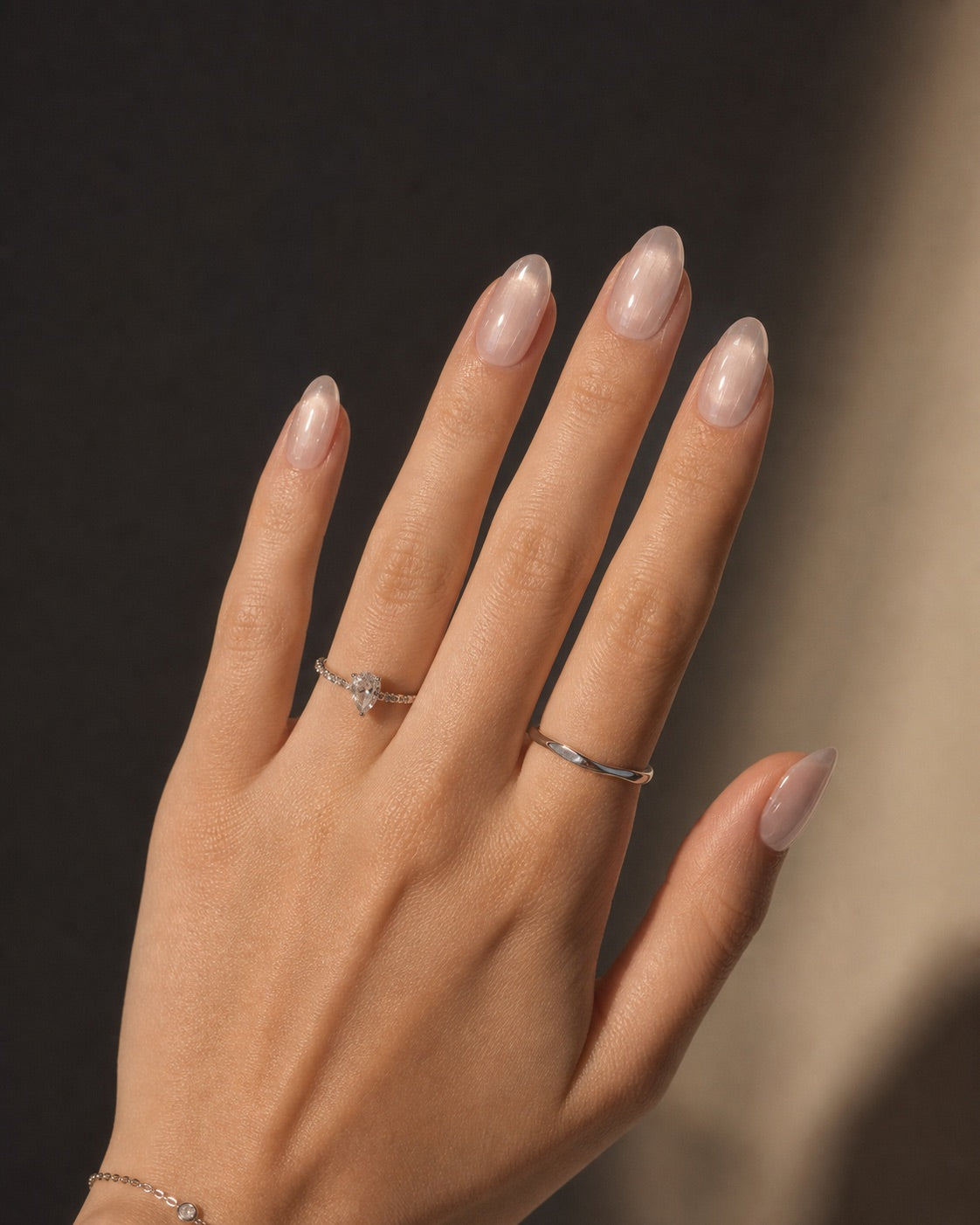 Barely Blush sheer nude pink almond press on nails with glossy jelly finish
