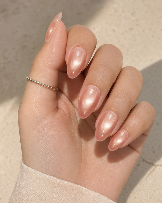 Natural nude pearl glazed almond nails manicure