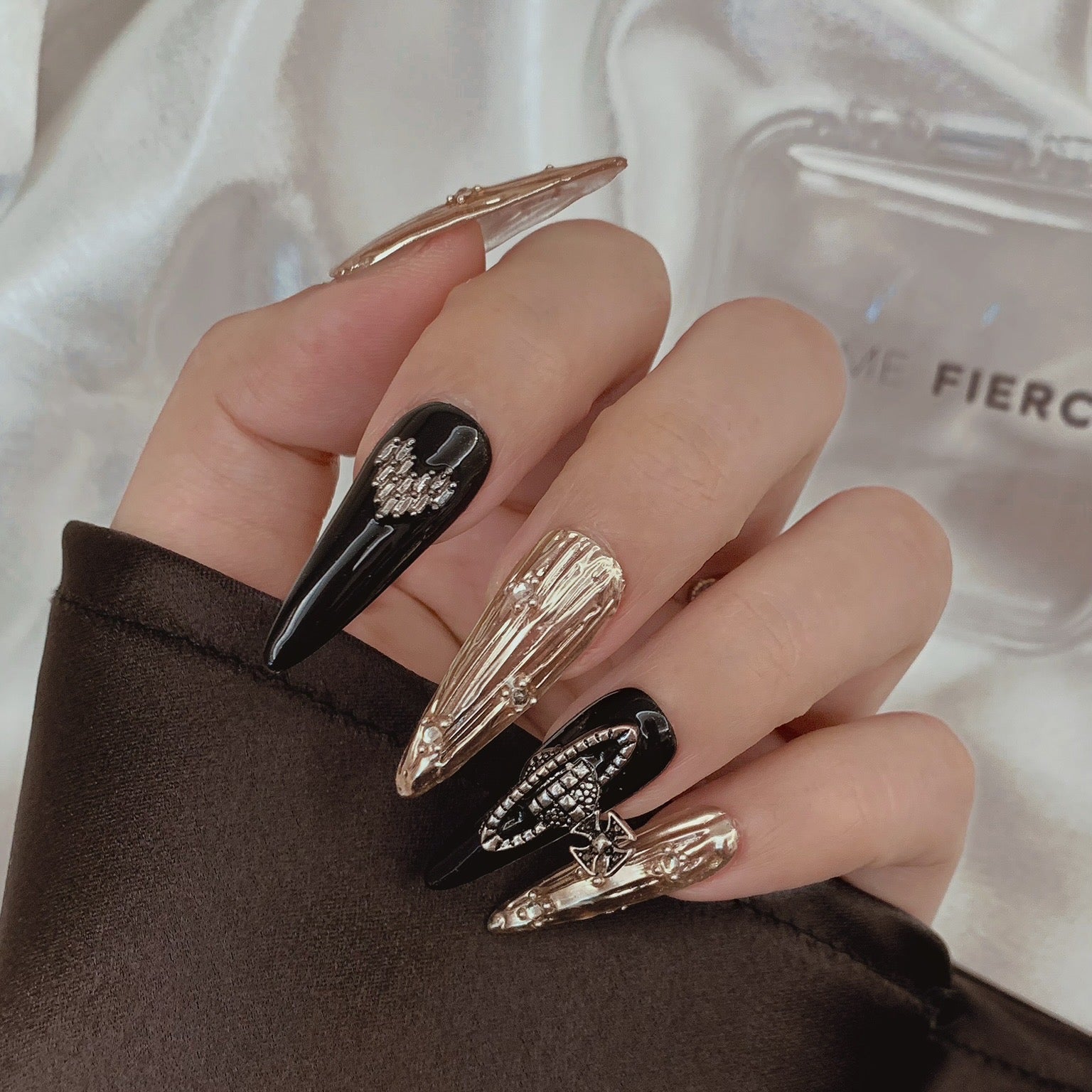 glam luxury black gold nails glossy finish