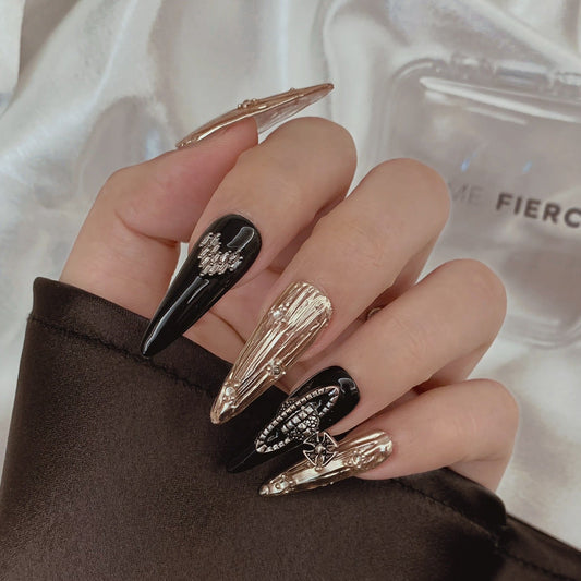 glam luxury black gold nails glossy finish