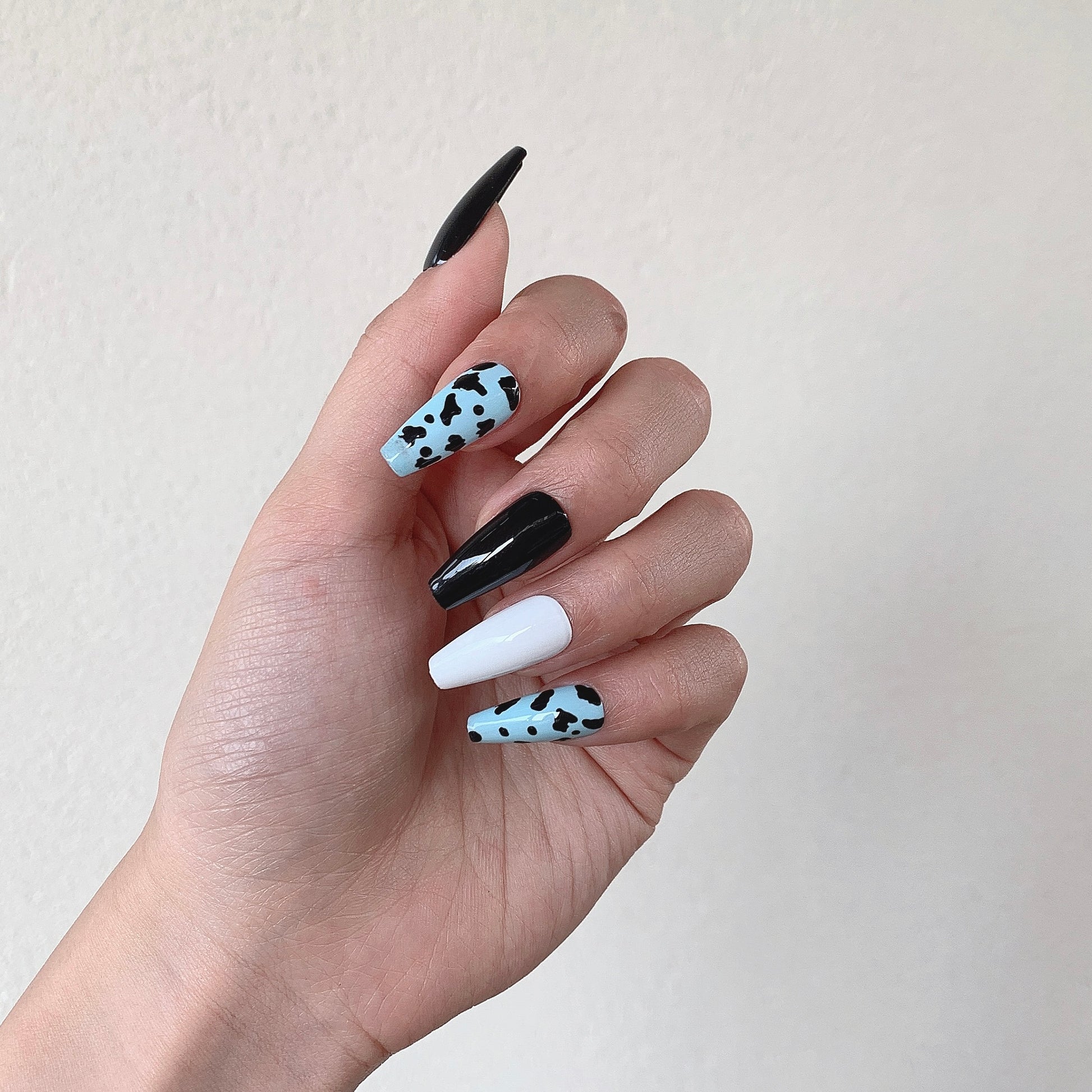 trendy statement press on nails black white design