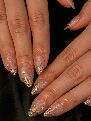 nude chrome press on nails with metallic detail