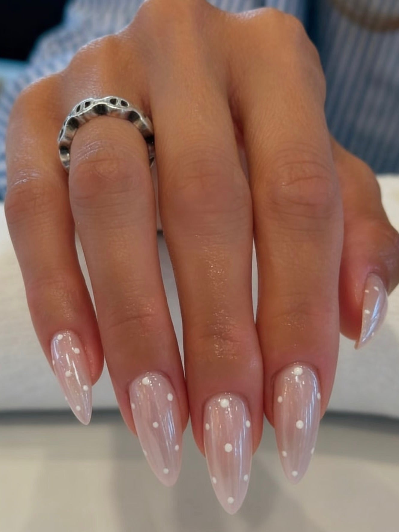 glossy nude press on nails with cute dot design